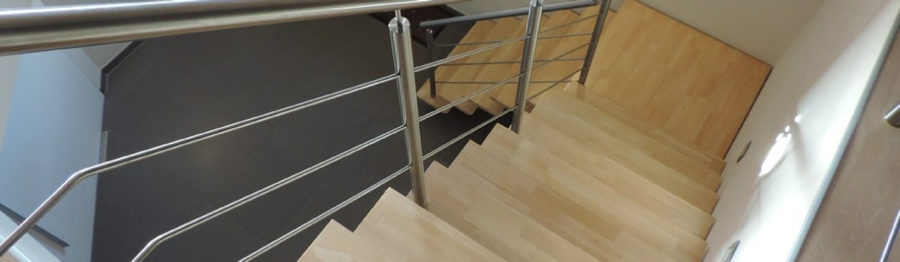 Trappen en leuningen inox en staal - Inoxdesign bvba